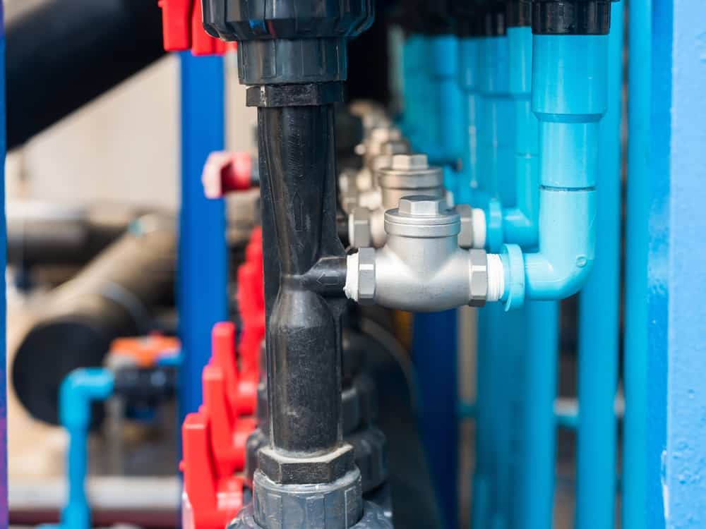 blue pipes and backflow valves.